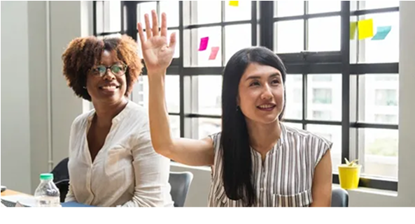 Women waving at another human